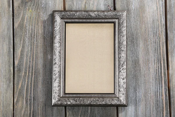 Oude frame met lege doek — Stockfoto