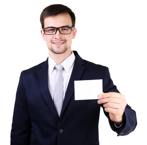 Elegante hombre de traje con tarjeta de visita aislada en blanco —  Fotos de Stock