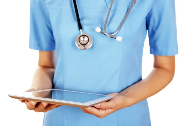 Female doctor working on digital tablet isolated on white — Stock Photo, Image