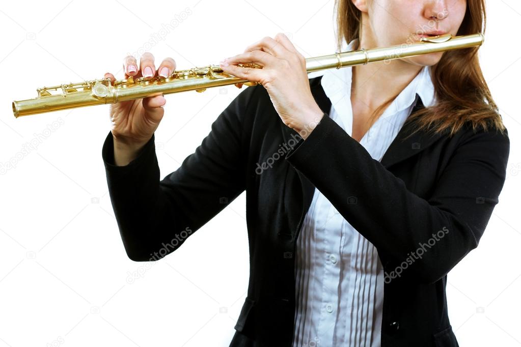 Musician playing flute isolated on white