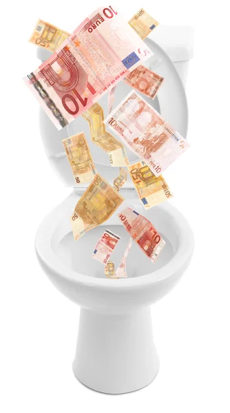 Un sacco di soldi sono buttati giù per il bagno, isolati su bianco — Foto Stock
