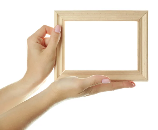 Female hands with wooden frame — Stock Photo, Image