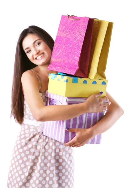 Hermosa joven con bolsas de compras y cajas aisladas en blanco —  Fotos de Stock