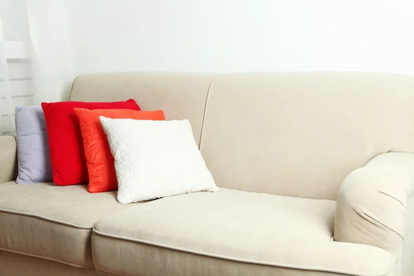 Colorful pillows on sofa — Stock Photo, Image