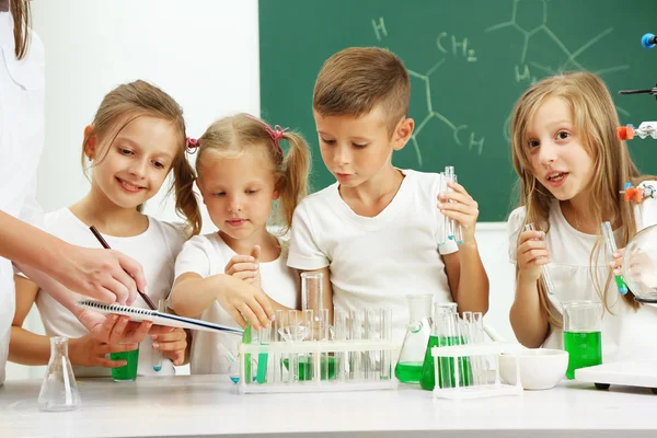 Cute pupils in chemistry class — Stock Photo, Image