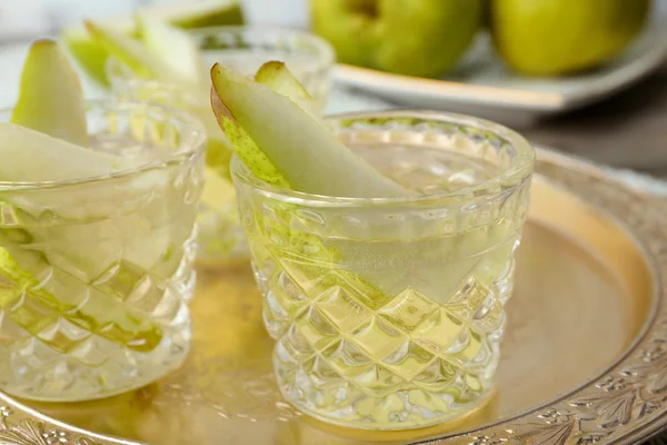 Pear juice with fresh fruits on table close up — Stock Photo, Image