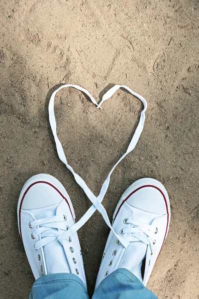 Female feet in gum shoes — Stock Photo, Image