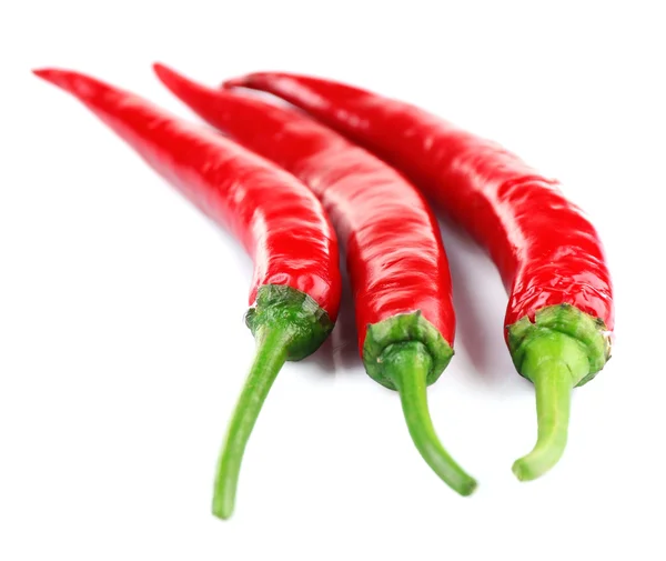 Red hot peppers isolated on white — Stock Photo, Image