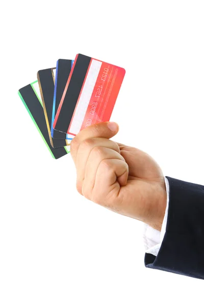 Cartões de crédito à mão, isolados sobre branco — Fotografia de Stock