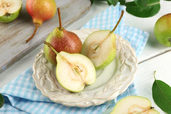 Fresh pears on wooden table — Stock Photo, Image