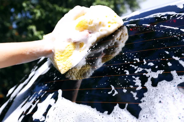 Hand washing car window — Stock Photo, Image