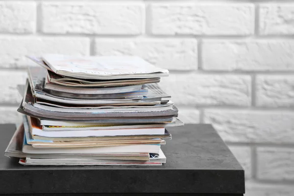 Stack of magazines on table — Stock Photo, Image