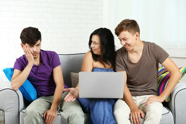 Happy family portrait on sofa — Stock Photo, Image