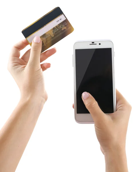 Руки держат смартфон и кредитную карту — стоковое фото