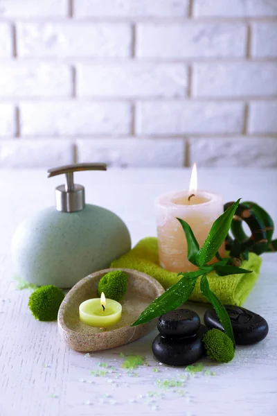 Beautiful composition of spa treatment on white wooden table — Stock Photo, Image