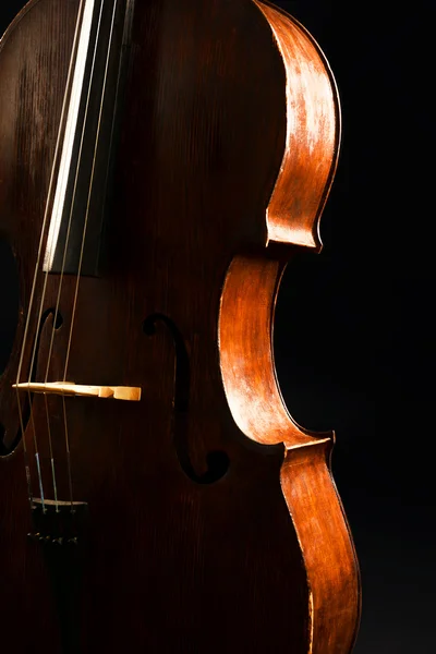 Vintage cello on dark background — Stock Photo, Image