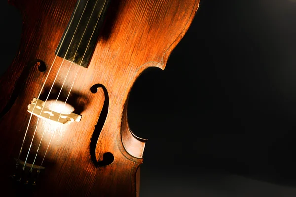 Violoncelo vintage em fundo escuro — Fotografia de Stock