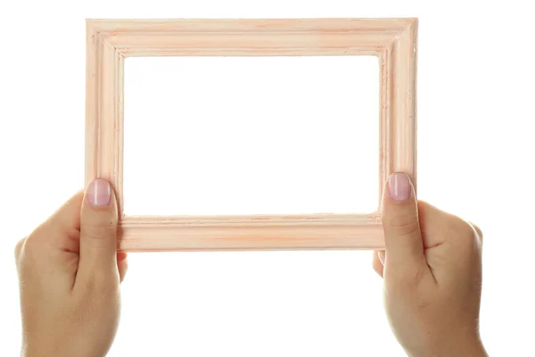 Female hands with wooden frame, isolated on white — Stock Photo, Image