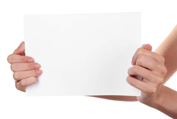 Female hands holding paper blank isolated on white — Stock Photo, Image