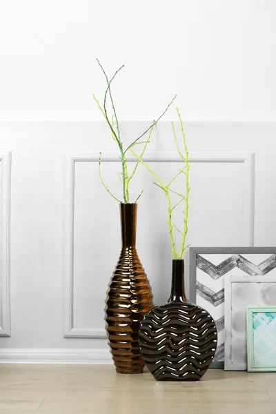 Modern vases on floor in room — Stock Photo, Image