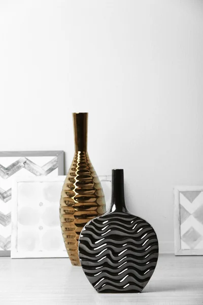 Modern vases on floor in room — Stock Photo, Image