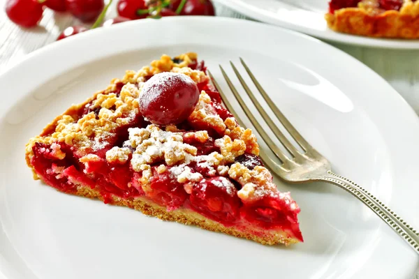 Tasty homemade pie with cherries on table close up — Stock Photo, Image