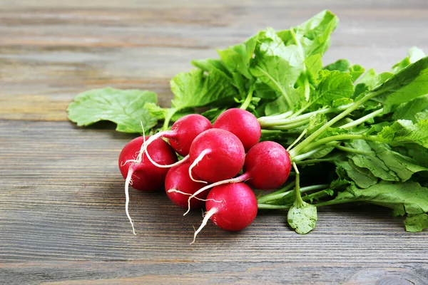 Fresh red radish on wooden background — Stock Photo, Image