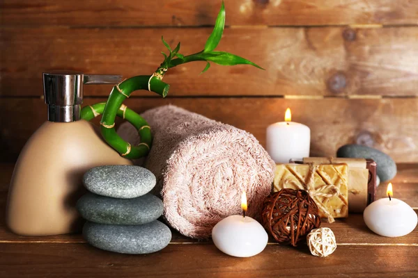 Beautiful spa composition with candles on wooden background — Stock Photo, Image