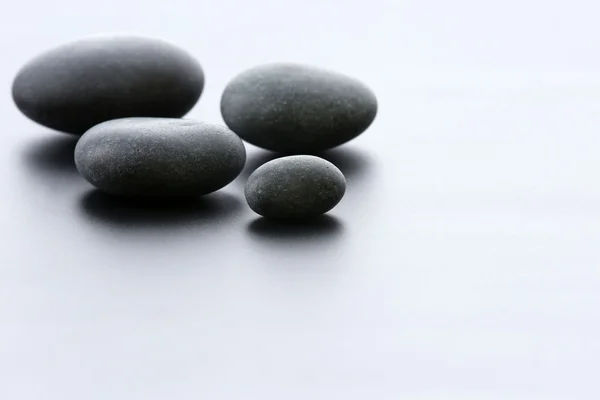 Spa stones on gray background — Stock Photo, Image