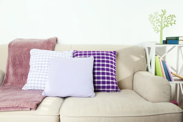 Colorful pillows on sofa, close-up — Stock Photo, Image