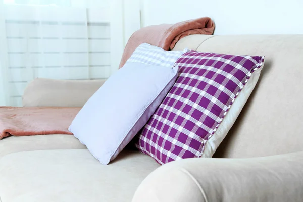 Colorful pillows on sofa, close-up — Stock Photo, Image