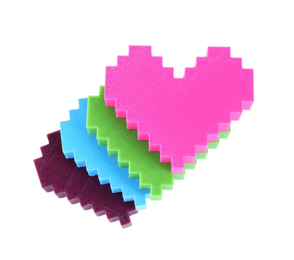 Plastic puzzle hearts isolated on white — Stock Photo, Image