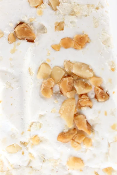 Sweet nougat with hazelnuts close up — Stock Photo, Image