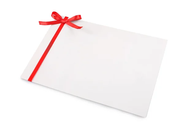 Carta decorata con fiocco isolato su bianco — Foto Stock
