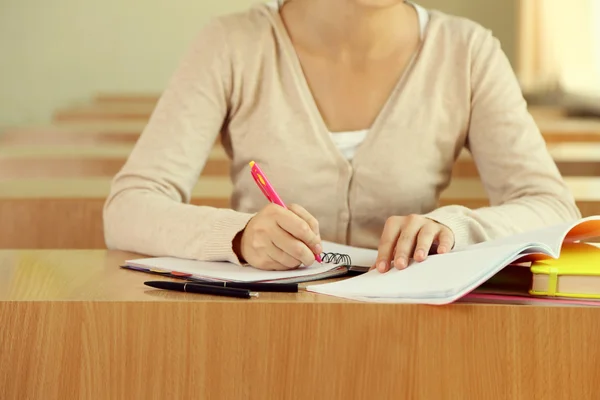 Female hand writing in notebook, close-up — Stock Photo, Image