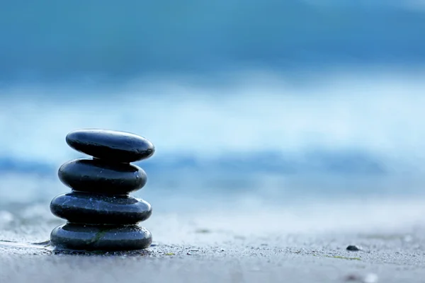 Spa stones on sea beach outdoors — Stock Photo, Image