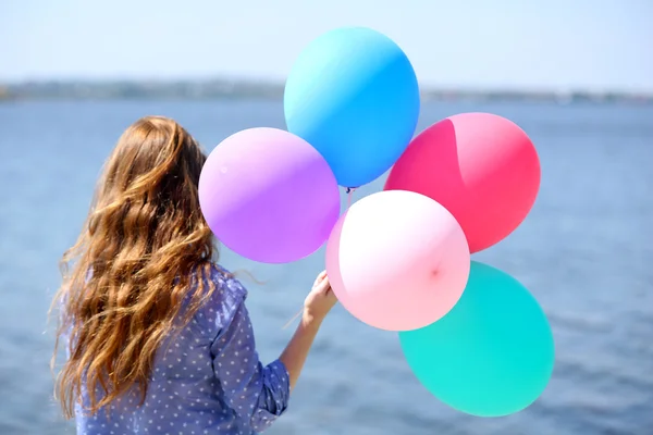 Chica con globos de colores —  Fotos de Stock