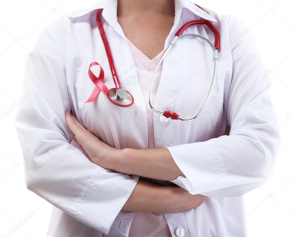 Doctor with ribbon formed Aids symbol isolated on white