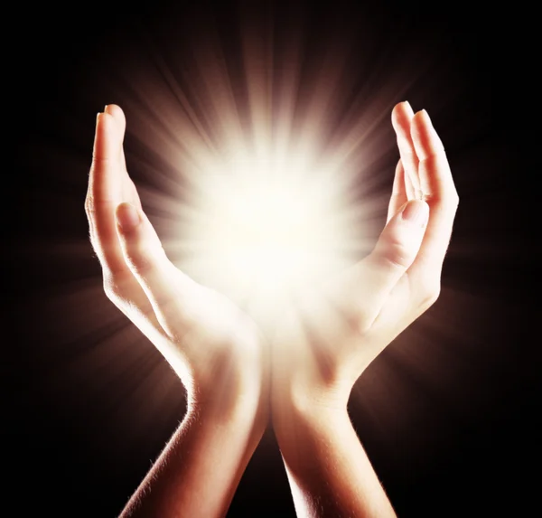 Light in woman hands — Stock Photo, Image