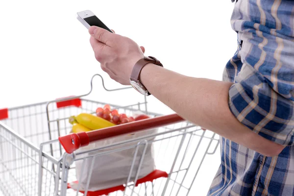 Young man holding mobile phone — Stock Photo, Image