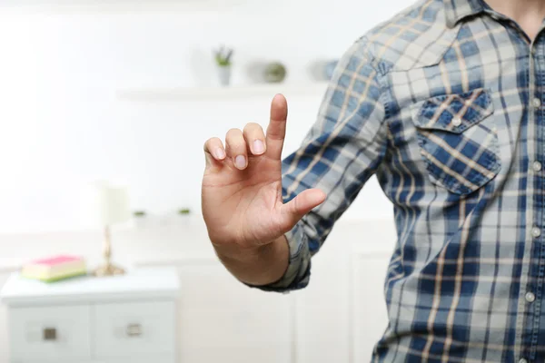 Young man push button — Stock Photo, Image