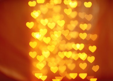 Kalplerde ışıkların şenlikli arka plan