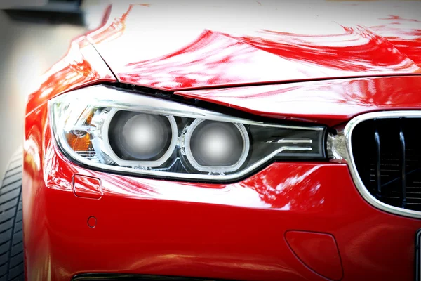 Headlights of red car — Stock Photo, Image