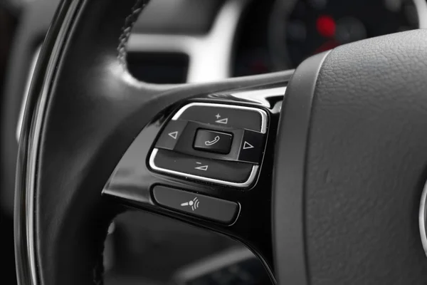 Modern car illuminated dashboard and steering wheel — Stock Photo, Image