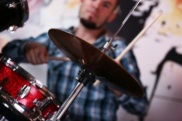 Excited drummer on  background — Stock Photo, Image