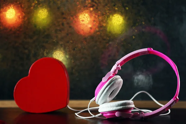 Decorative heart and headphones — Stock Photo, Image