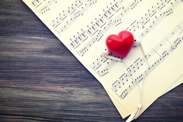 Earphones and music notes — Stock Photo, Image