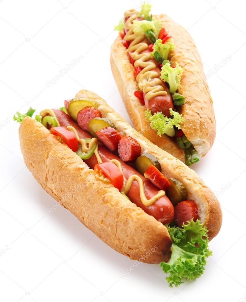 A pair of fresh hot dogs isolated on white