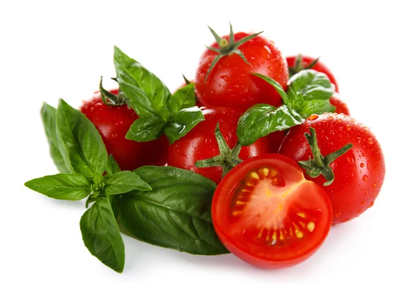 Cherry tomatoes with basil isolated on white — Stock Photo, Image