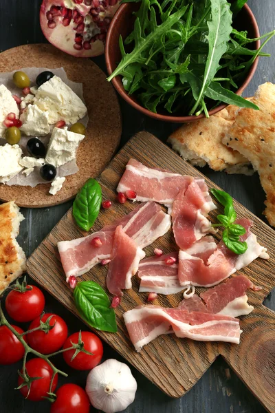 Ingredients of Mediterranean cuisine, on wooden board, close-up — Stock Photo, Image